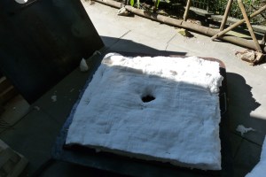 The lid with opening for chimney