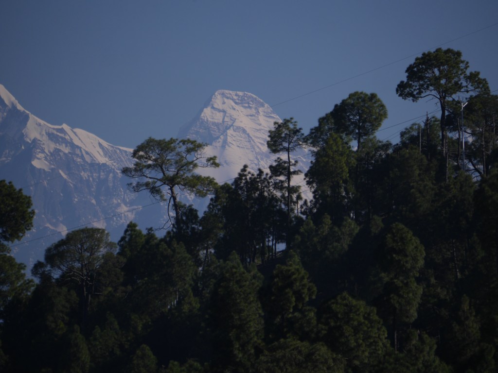 Nanda Devi on a clear day."“The station master at Kathgodam had made one feel immediately welcome and the first thing that cheered my eyes outside the station was a sepoy of the Kumaon Regiment feeding a dogcalled Tommy.”- Bill Aitken The Nanda Devi Affair

